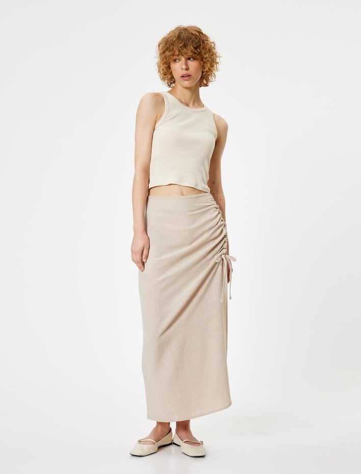  Uzun Etek Yırtmaçlı Büzgülü A Kesim Standart Bel