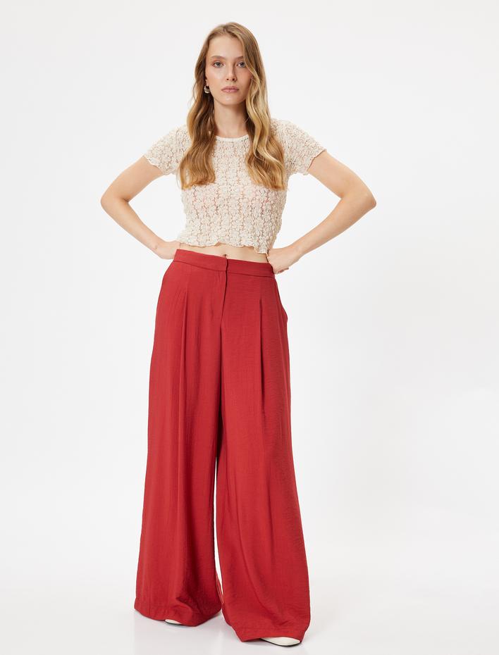  Koton X Melis Ağazat - Viskon Geniş Paça Pantolon Cepli Pile Detaylı Rahat Kalıp