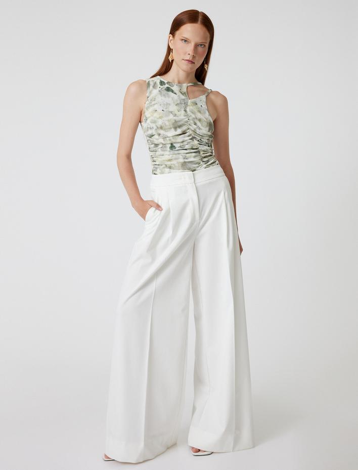  Koton X Sima Tarkan - Asimetrik Askılı Üst Çiçekli Drapeli Slim Fit