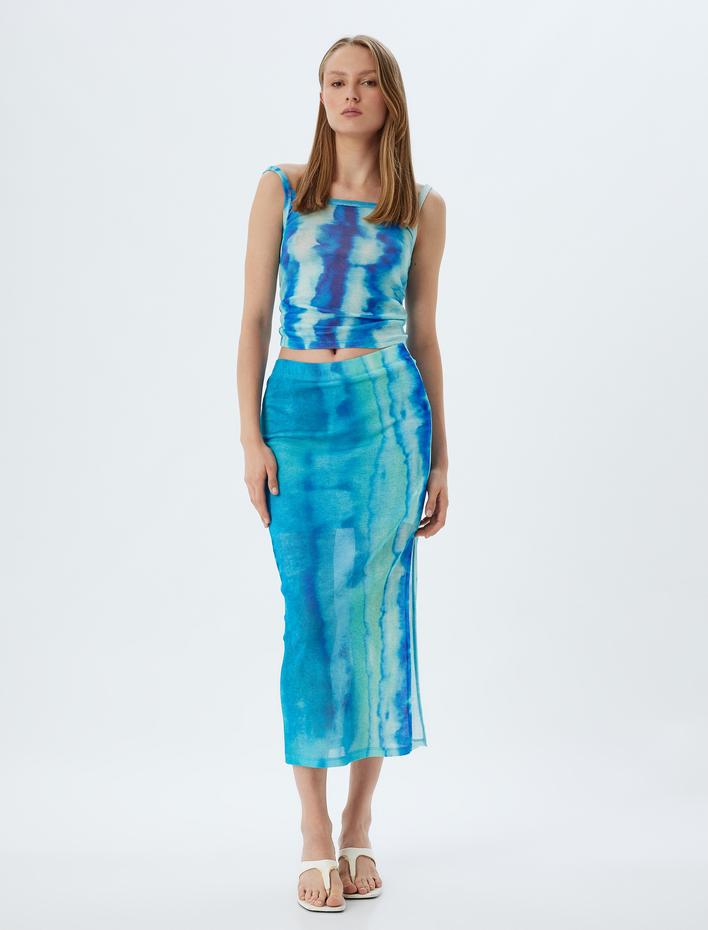  Koton X Şahika Ercümen - Midi Boy Etek Batik Desenli Yandan Yırtmaç Detaylı