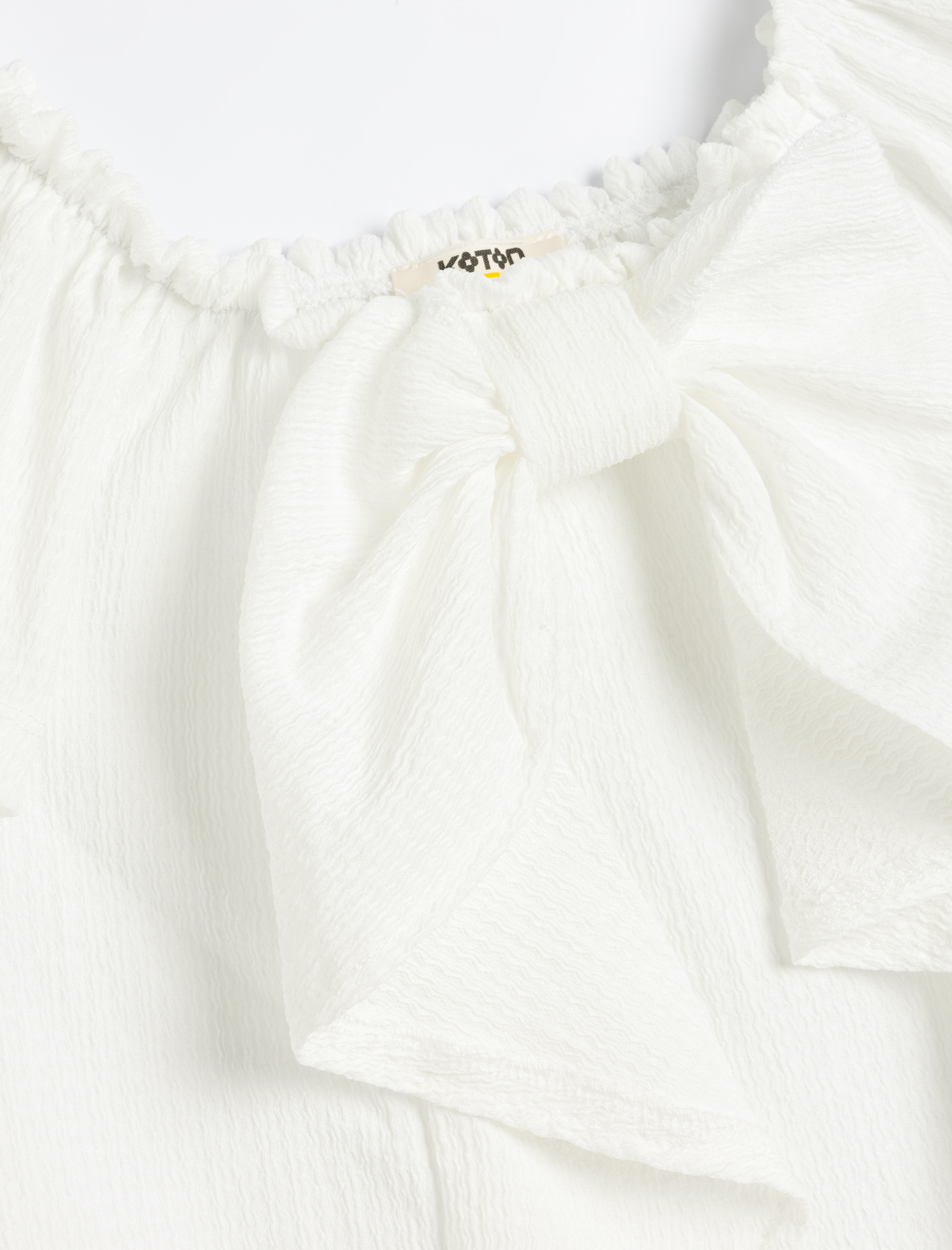  Kız Çocuk Fiyonk Detaylı Yuvarlak Yaka Kısa Kollu Bluz