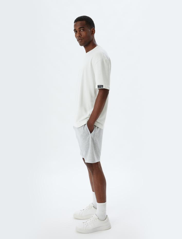  Spor Şort Oversize Beli Bağcıklı Cep Detaylı Pamuk Karışımlı