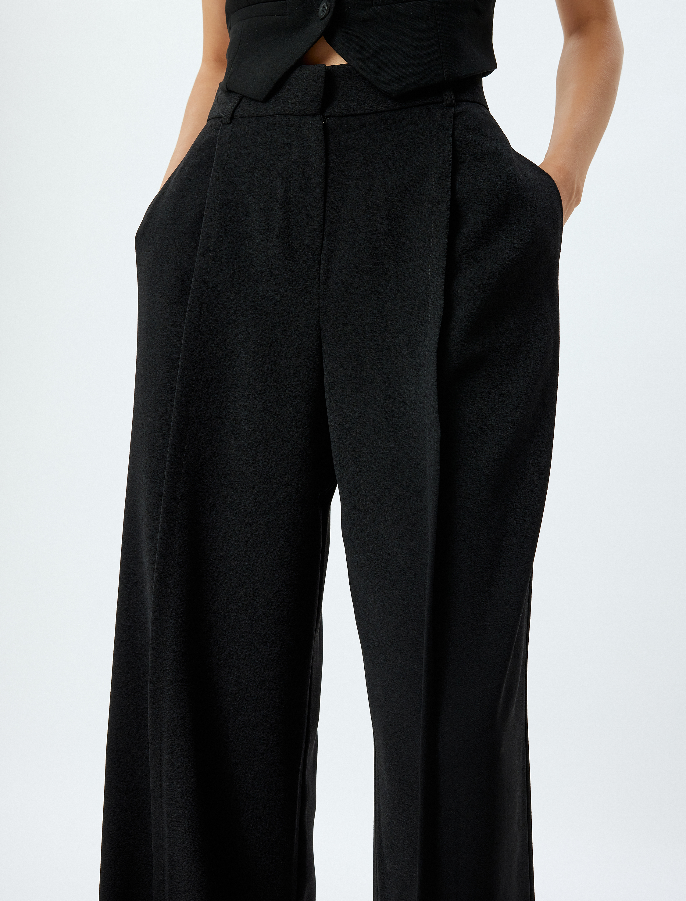   Yüksek Bel Cepli Pile Detaylı Krep Kumaş Palazzo Pantolon