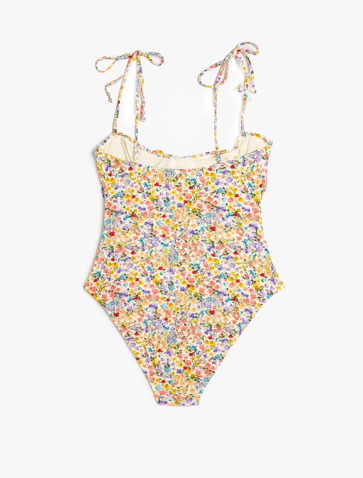  Koton X Sibil Çetinkaya - Çiçekli Mayo Balenli Drape Detaylı İnce Askılı Kalp Yaka