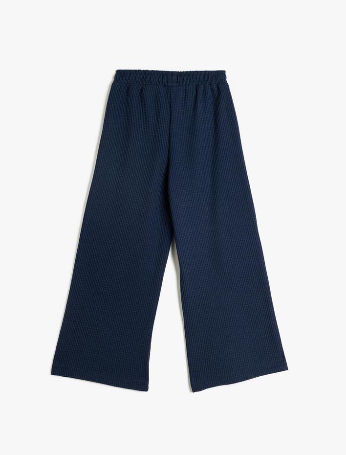 Kız Çocuk Bol Paça Pantolon Rahat Kesim Beli Lastikli Dokulu