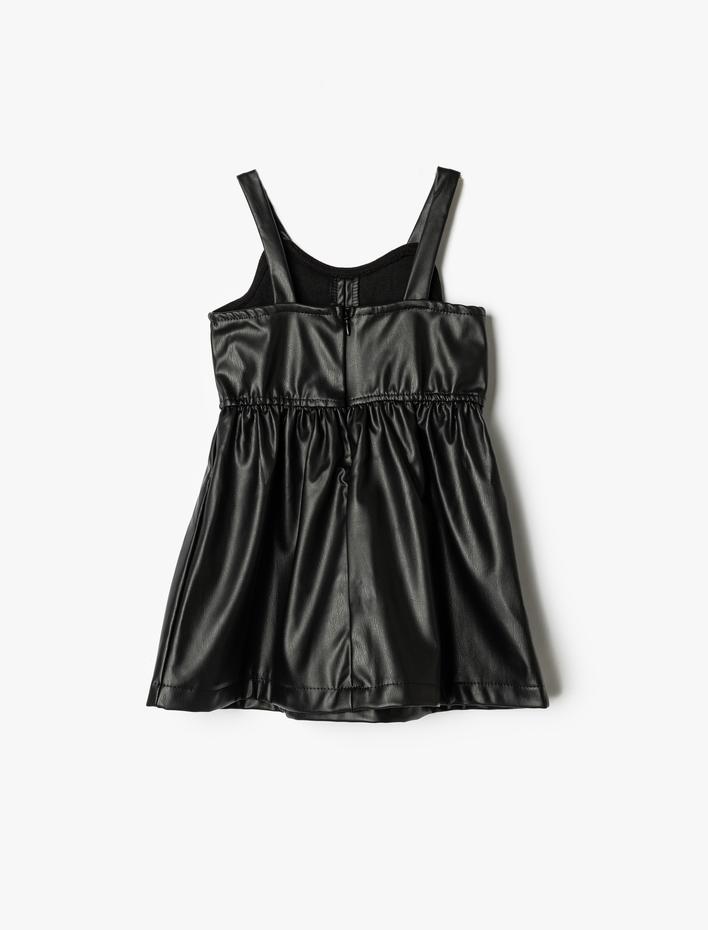 Kız Bebek Askılı Pileli Deri Görünümlü Elbise