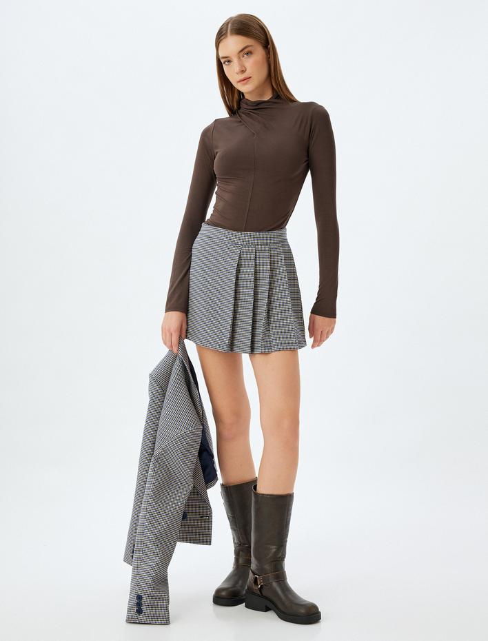  Koton X Sima Tarkan - Viskon Body Asimetrik Drapeli Dik Yaka Uzun Kollu