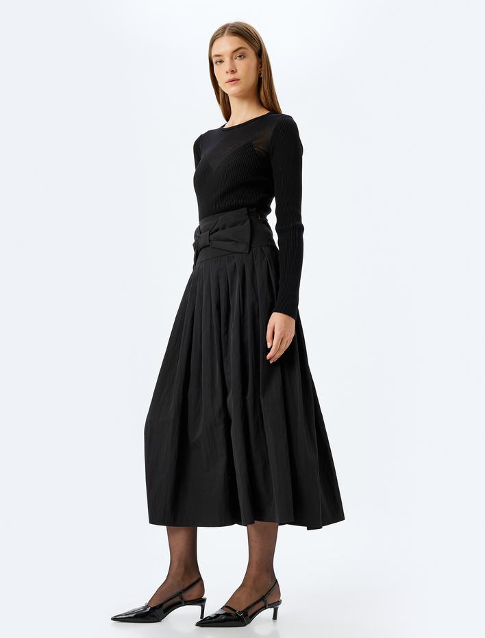  Fiyonk Detaylı Pileli Uzun Kloş Etek