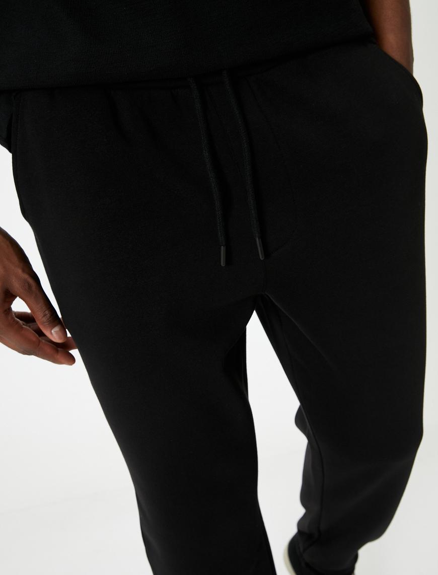   Beli Bağcıklı Cep Detaylı Şardonlu Jogger Eşofman Altı