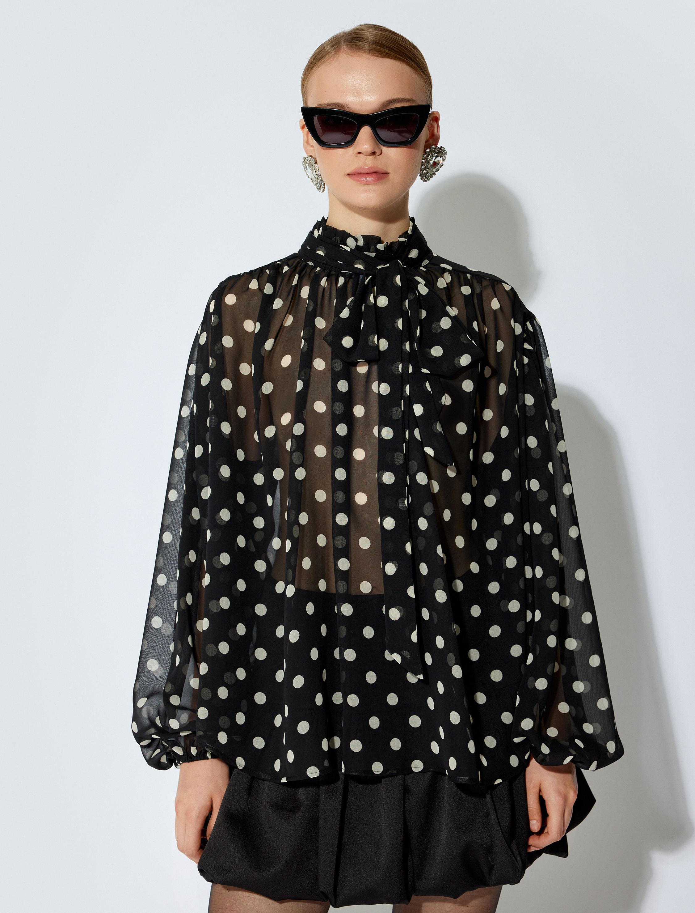   Koton X Sibil Çetinkaya - Transparan Uzun Kollu Şal Yaka Puantiyeli Şifon Bluz