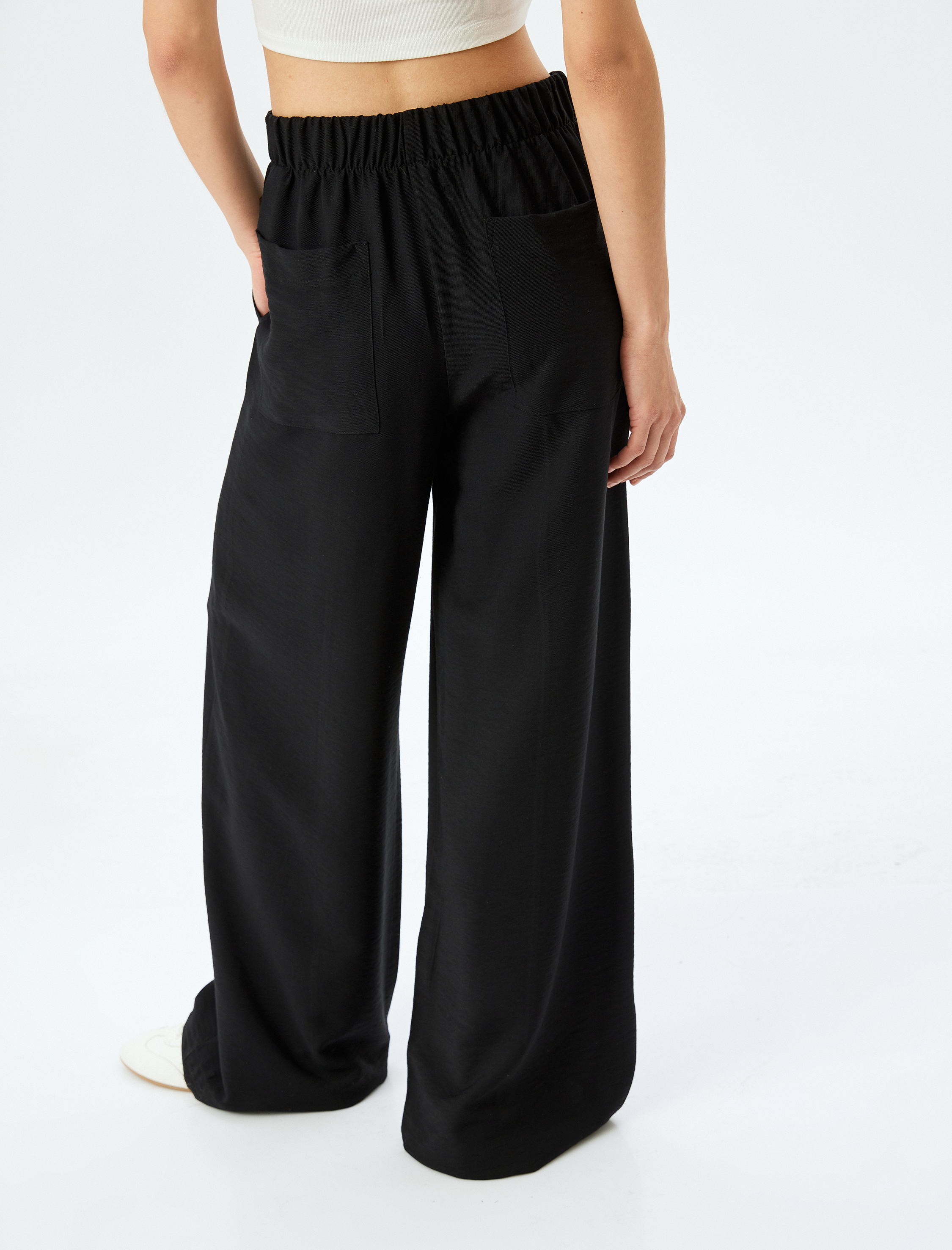   Beli Bağlamalı Lastikli Cepli Viskon Geniş Paça Eşofman Pantolon