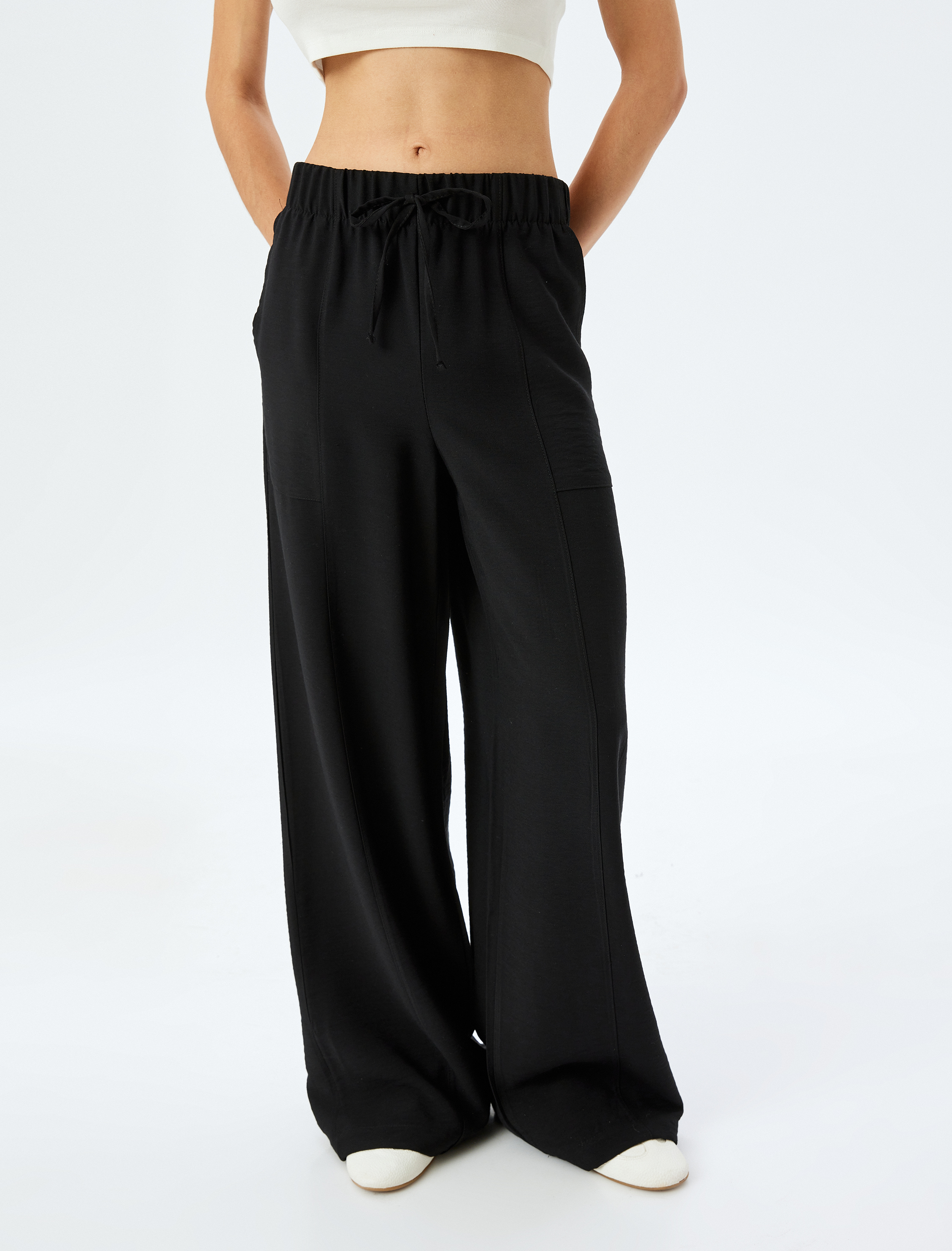   Beli Bağlamalı Lastikli Cepli Viskon Geniş Paça Eşofman Pantolon