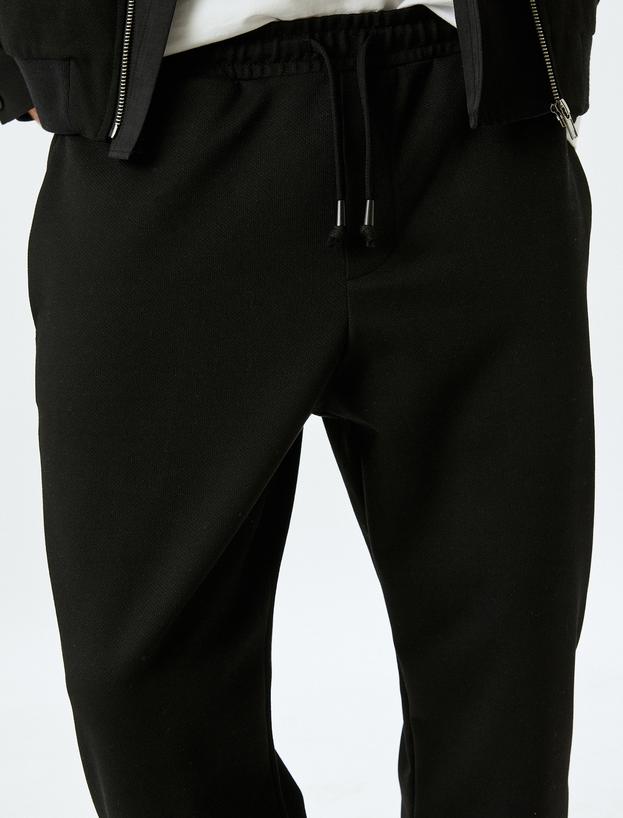 Viskon Karışımlı Cep Detaylı Katlamalı Paça Beli Bağcıklı Pantolon_4