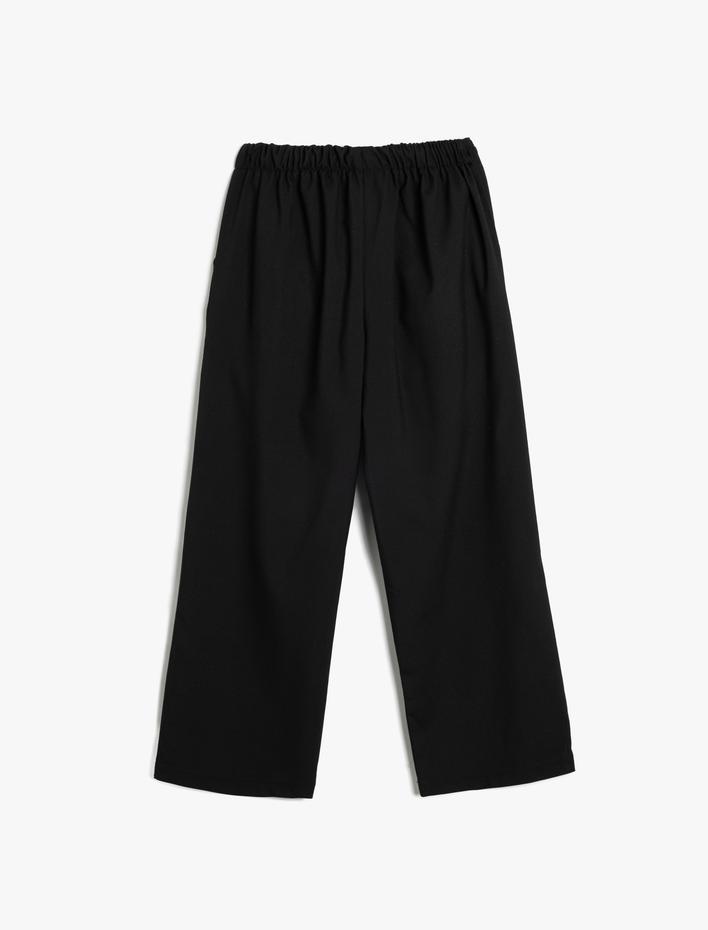 Kız Çocuk Bol Paça Pantolon Cep Detaylı Beli Bağlamalı