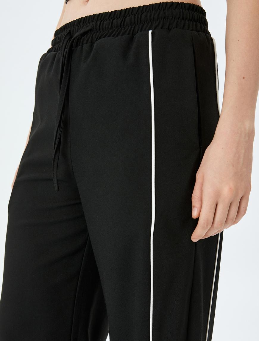   Koton X İnji - Beli Bağcıklı Biyeli Cepli Geniş Paça Eşofman Pantolon
