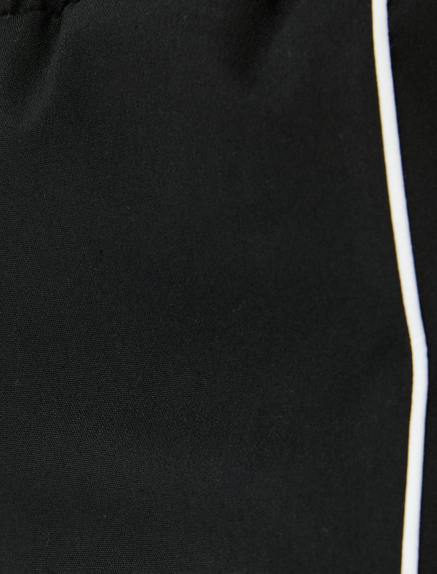   Koton X İnji - Beli Bağcıklı Biyeli Cepli Geniş Paça Eşofman Pantolon