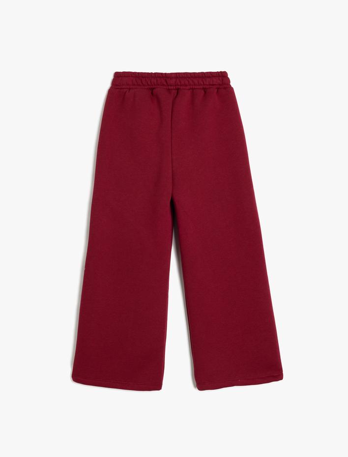 Kız Çocuk Pamuklu Şardonlu Beli Lastikli Cepli Basic Bol Paça Pantolon