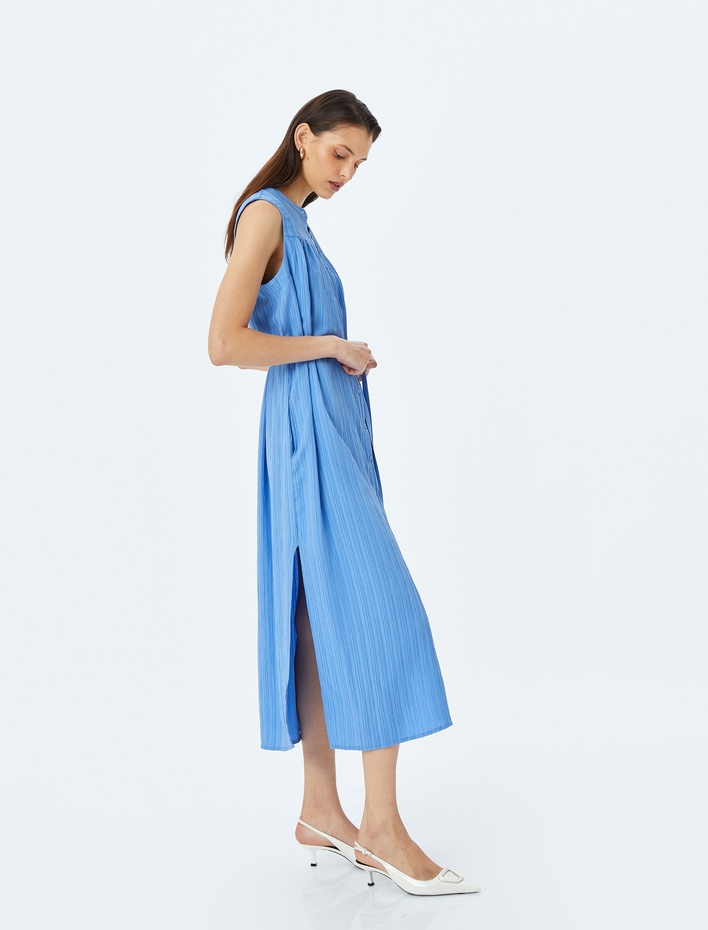  Yuvarlak Yaka Kolsuz Kuşaklı Dokulu Uzun Gömlek Elbise