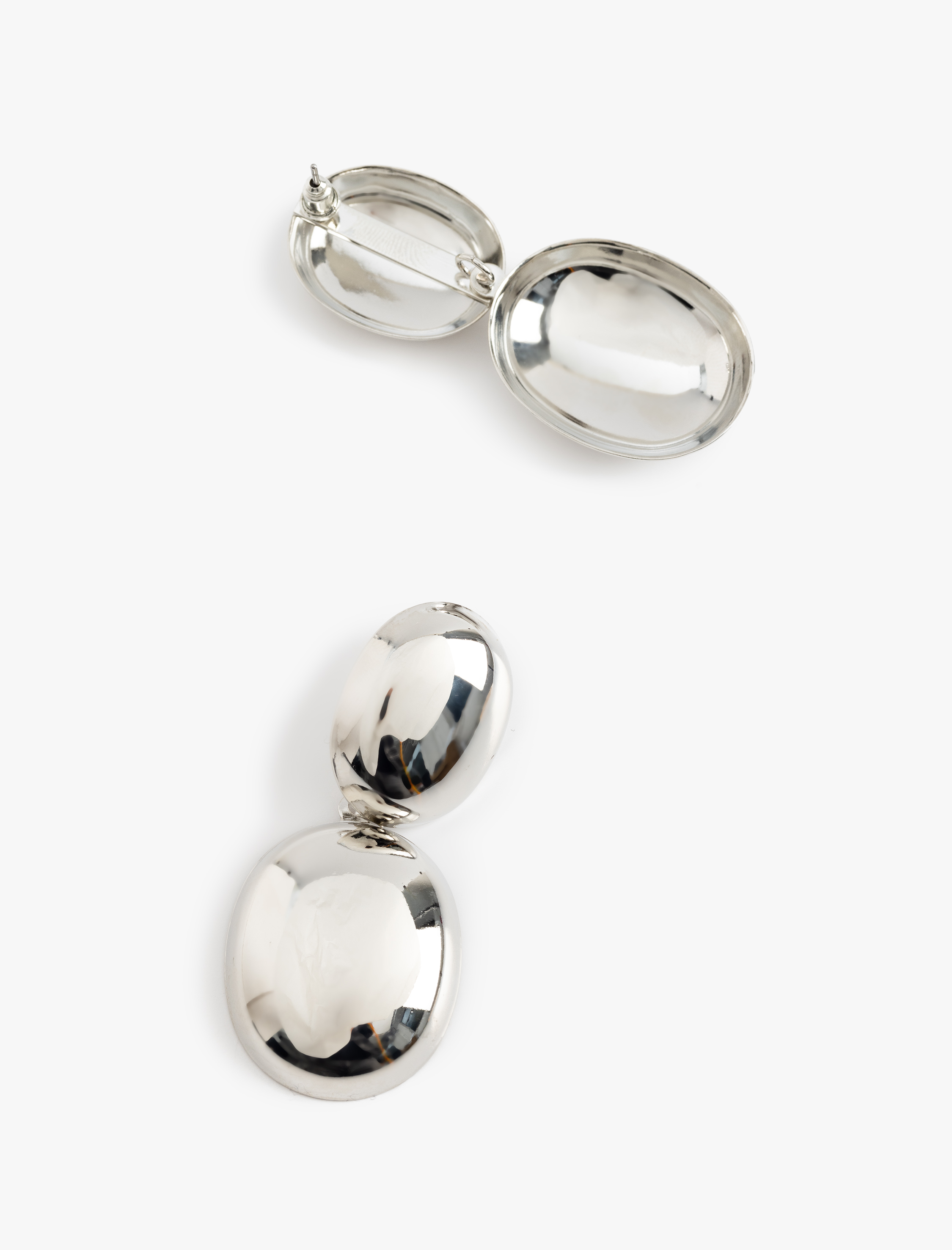  Kadın Sallantılı Çelik Oval Küpe