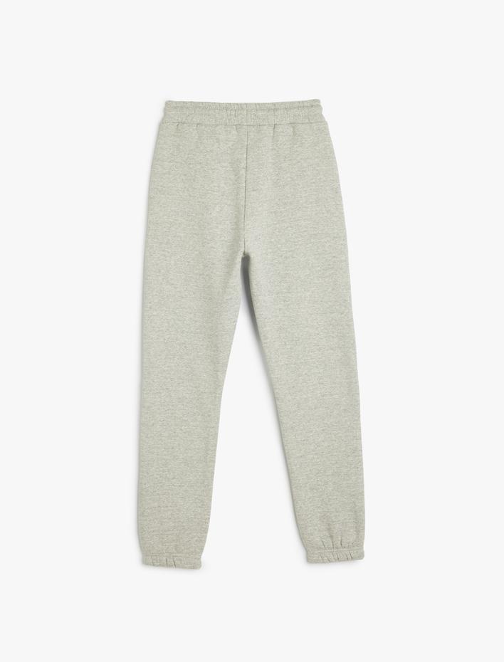 Erkek Çocuk Cep Detaylı Beli Bağlamalı Baskılı Şardonlu Jogger Eşofman Altı