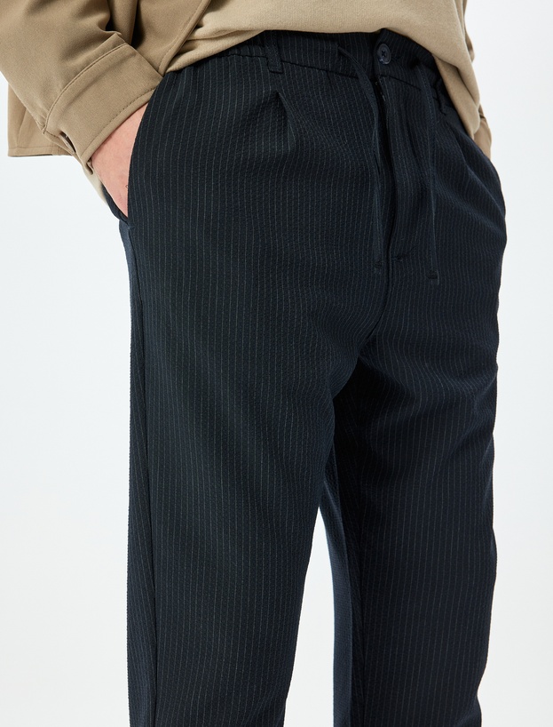 Katlamalı Paça Viskon Karışımlı Düğmeli Beli Bağcıklı Slim Fit Pantolon_4