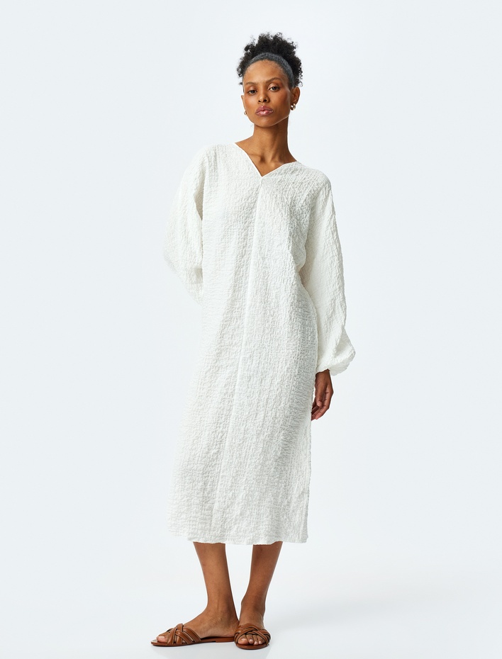  Rahat Kalıp Uzun Balon Kollu V Yaka Dokulu Midi Elbise