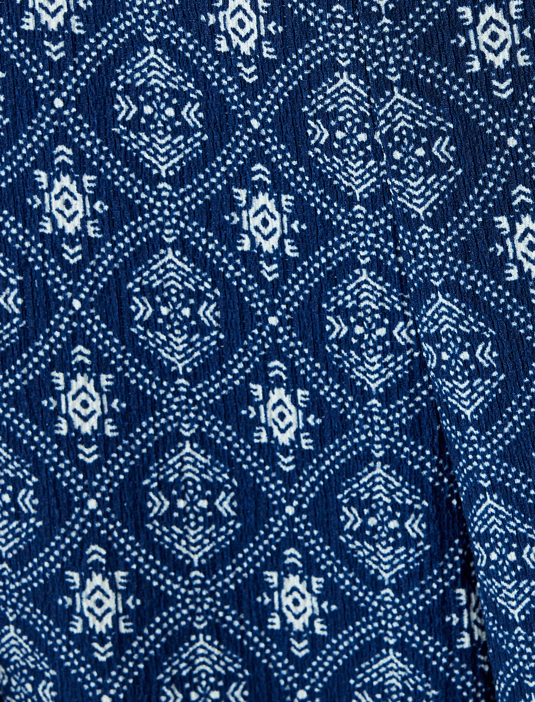   Desenli Geniş Paça Bağlama Detaylı Yırtmaçlı Pantolon Bürümcük