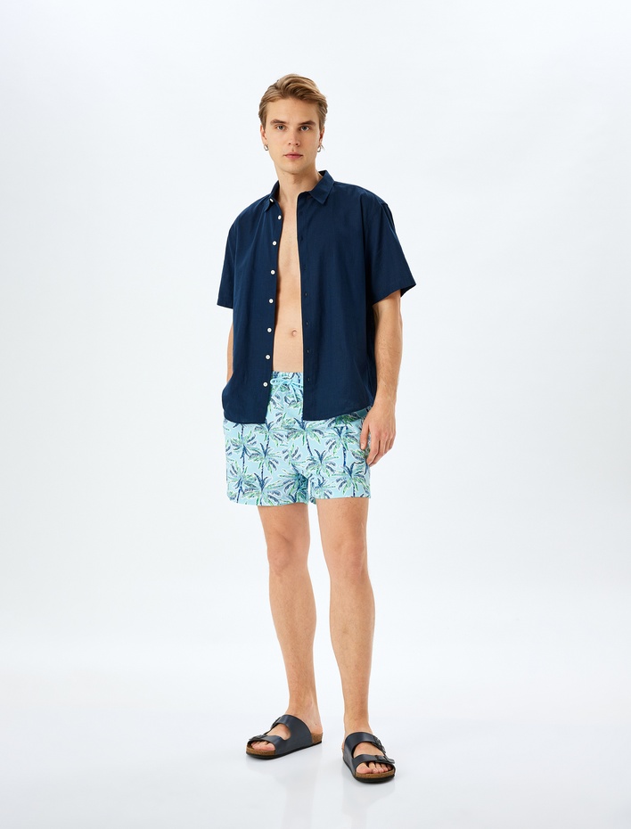  Palmiye Desenli Oversize Beli Bağcıklı Deniz Şortu