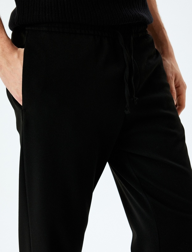Viskon Karışımlı Cep Detaylı Beli Bağcıklı Eşofman Pantolon_4