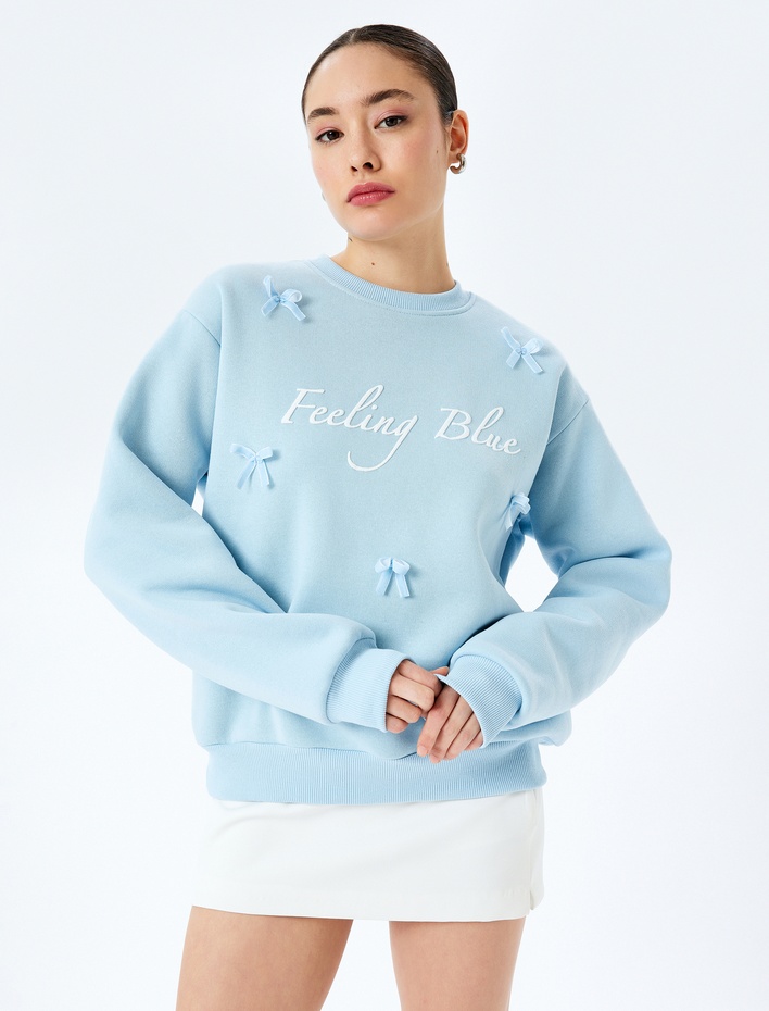  Fiyonklu Slogan Baskılı Bisiklet Yaka Sweatshirt