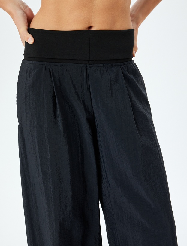 Cepli Düşük Bel Geniş Paça Paraşüt Kumaş Pantolon_4
