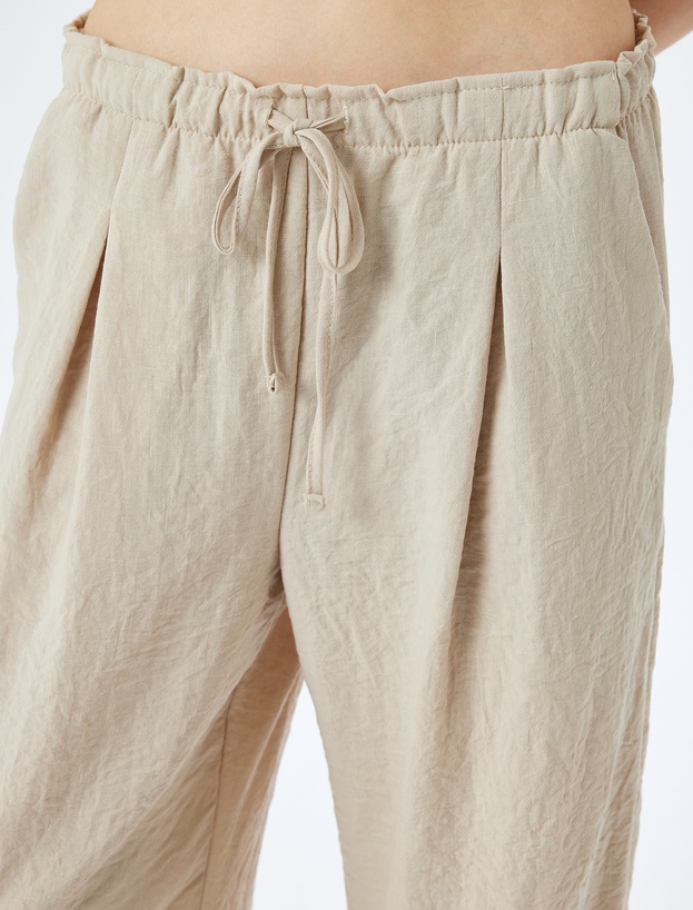 Beli Bağcıklı Cepli Düz Paça Pileli Pantolon_4