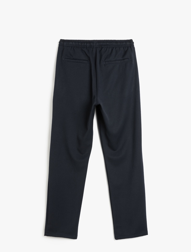 Viskon Karışımlı Cep Detaylı Beli Bağcıklı Eşofman Pantolon_1