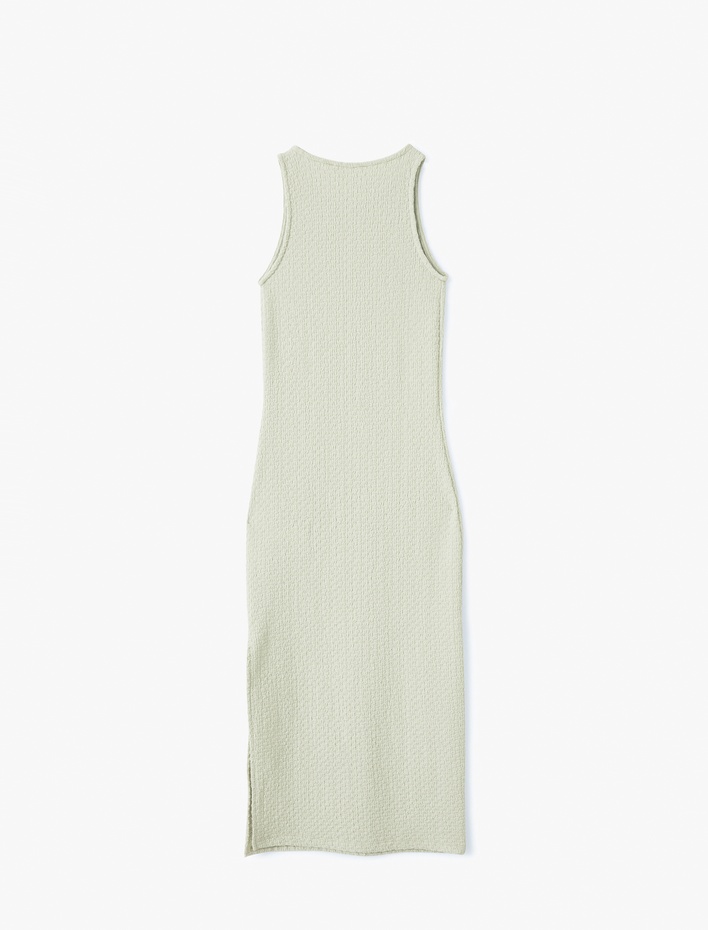  Bisiklet Yaka Kolsuz Yırtmaçlı Dokulu Midi Boy Kalem Elbise