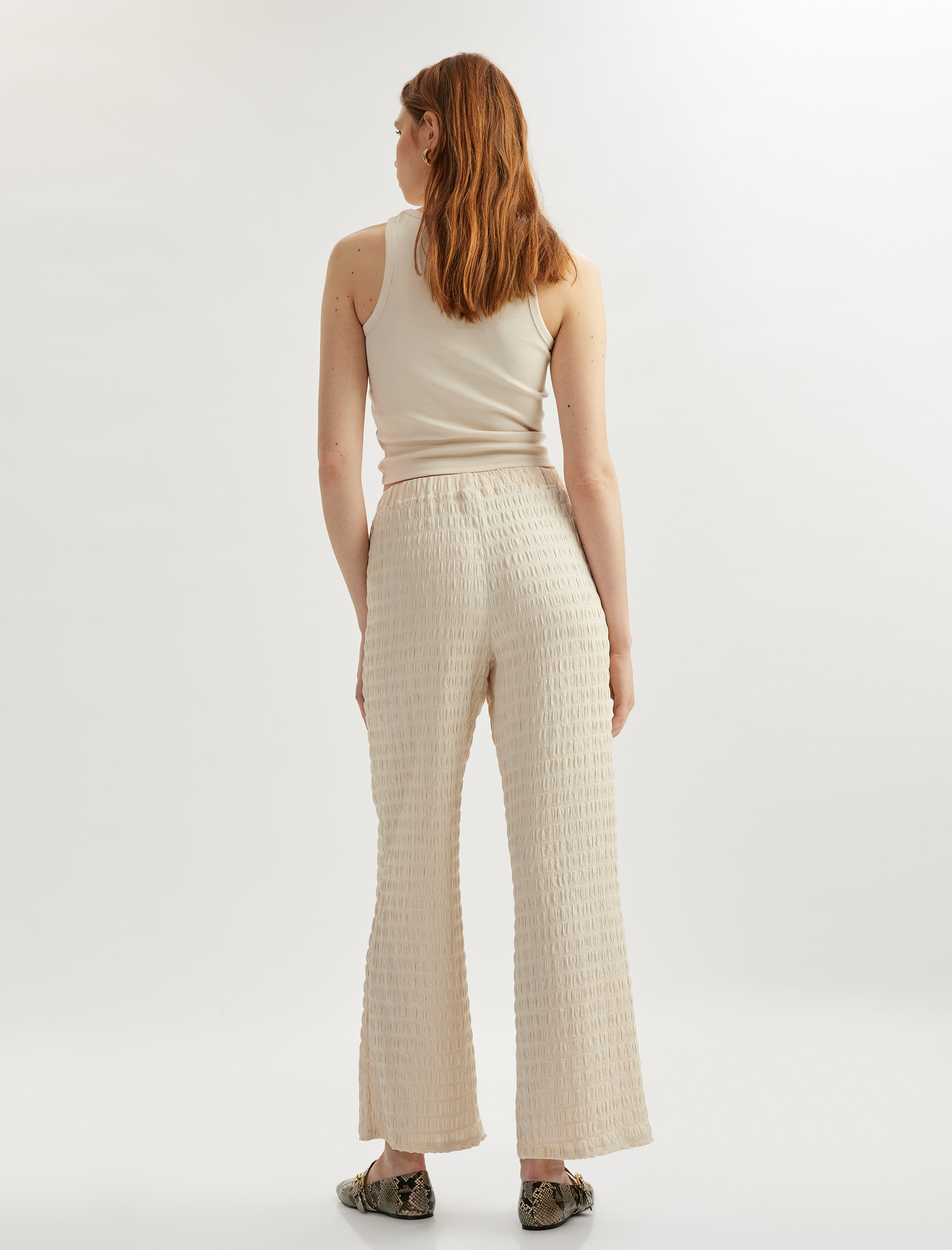   Beli Lastikli Dokulu Bol Paça Dokulu Pantolon