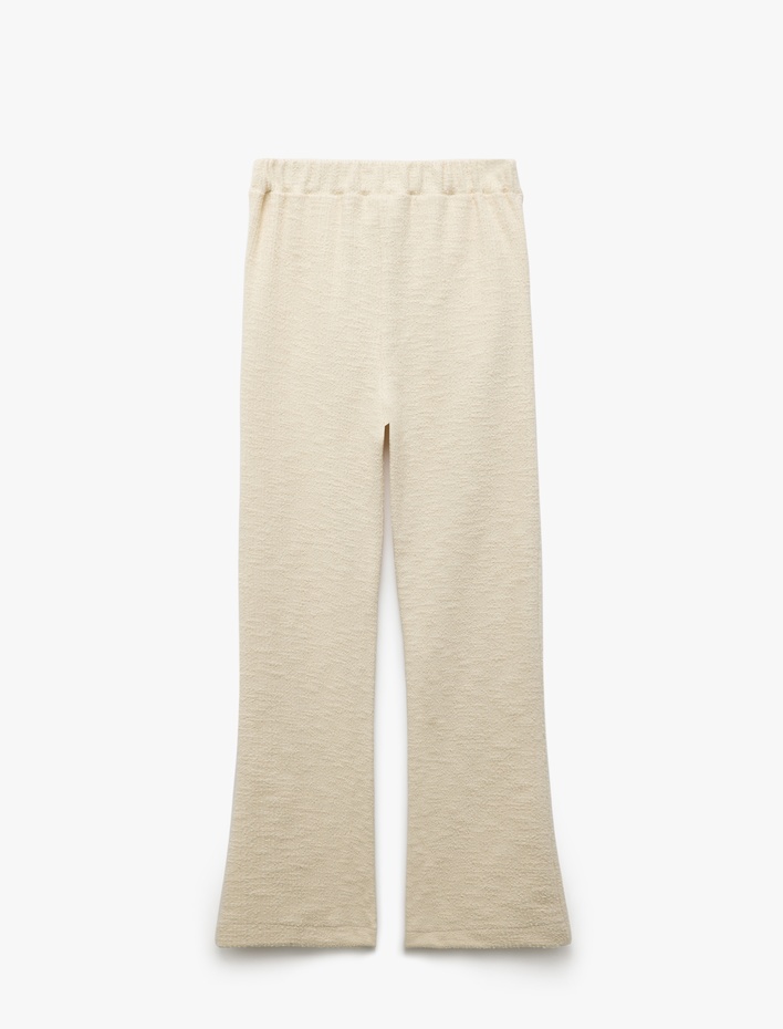 Kız Çocuk Cepli Pile Detaylı Düğmeli Bol Paça Tüvit Pantolon