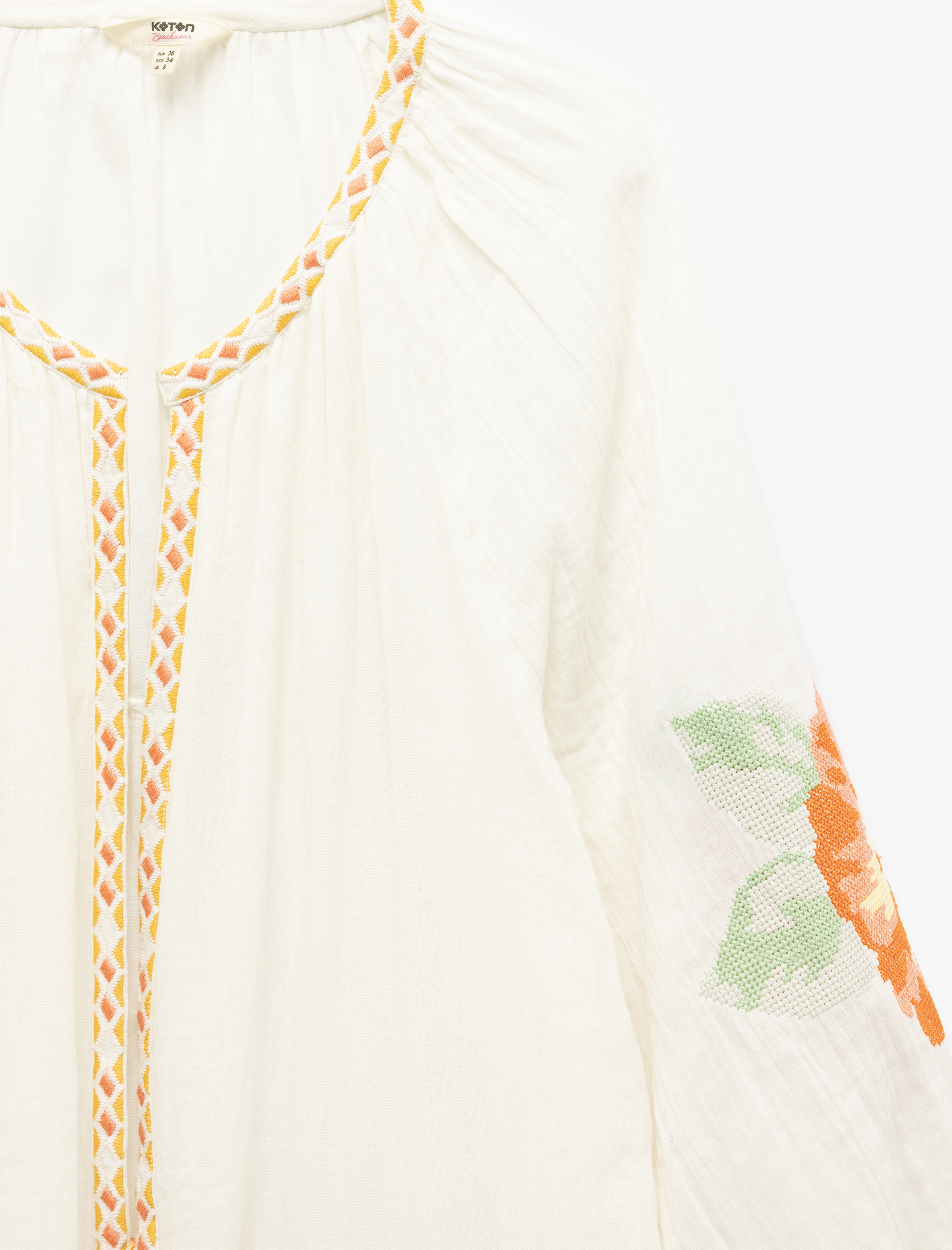   Pamuklu Çiçekli Nakış Detaylı Yuvarlak Yaka Uzun Balon Kollu Kaftan Plaj Elbisesi