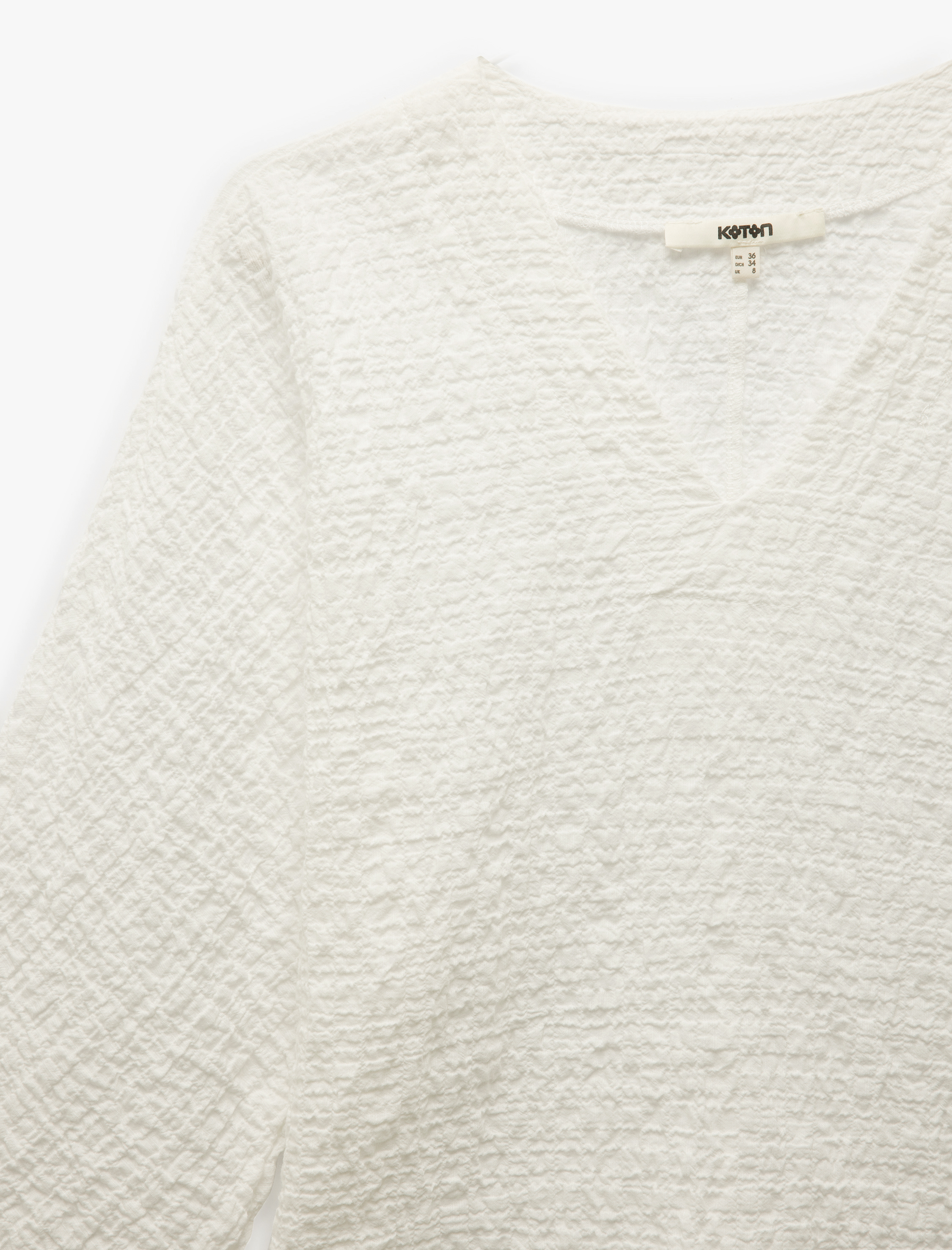   Pamuklu 3/4 Geniş Kol Dokulu V Yaka Bluz