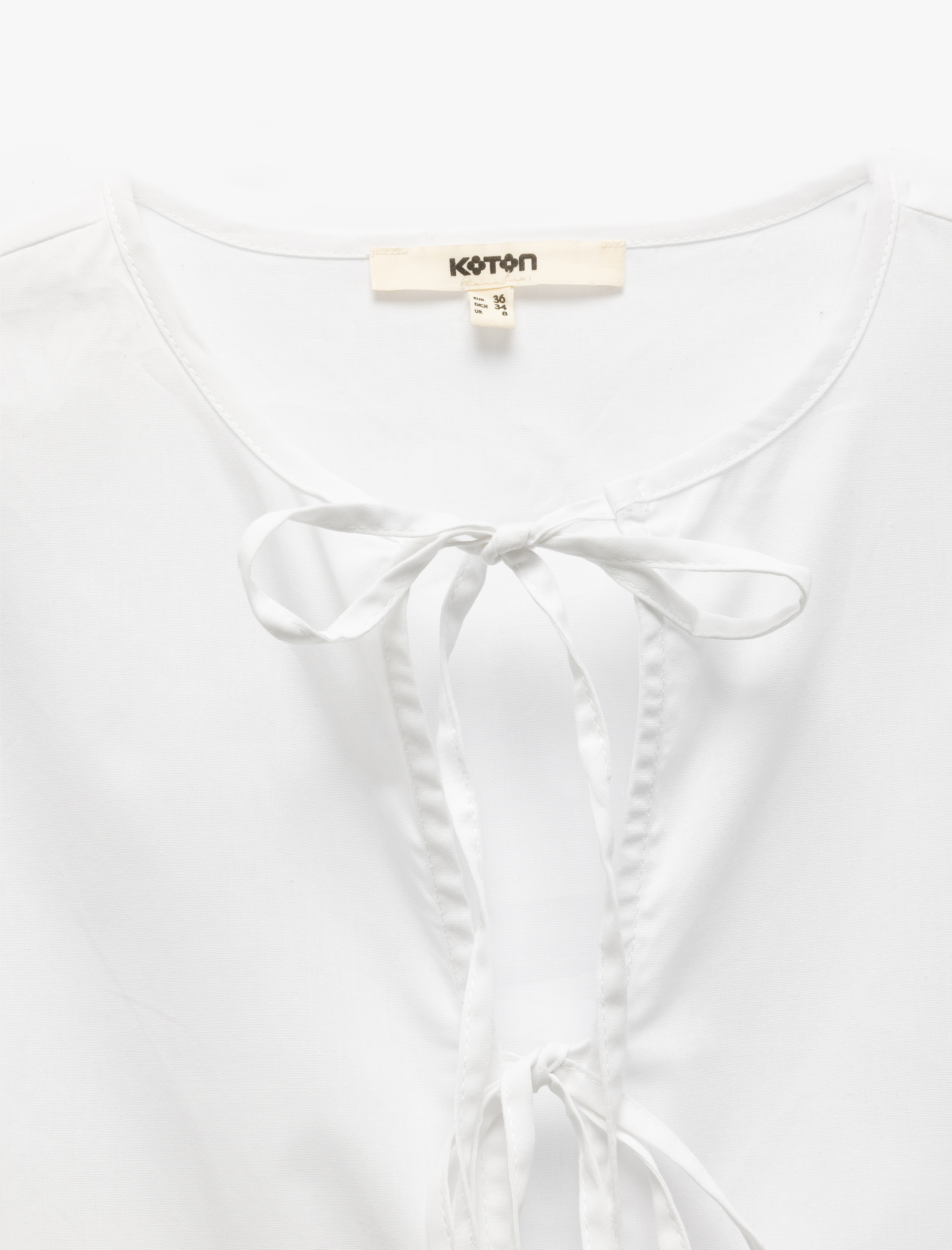   Pamuklu Önden Fiyonk Bağlamalı Kısa Balon Kollu Oversize Poplin Bluz