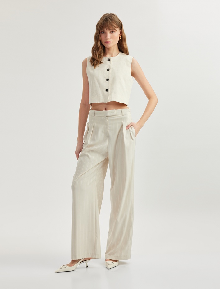  Cepli Pile Detaylı Geniş Paça Kumaş Pantolon