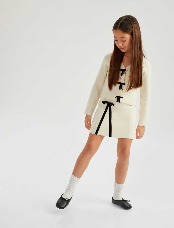 Kız Çocuk Beli Lastikli Fiyonk Detaylı Triko Etek