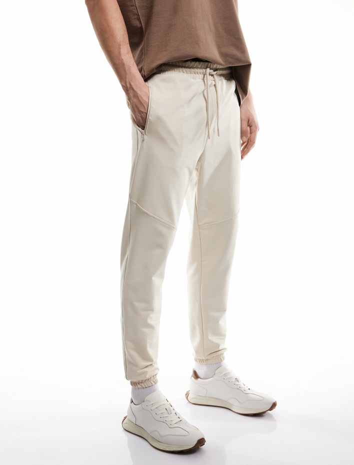  Fermuarlı Cepli Pamuklu Dikiş Detaylı Beli Bağcıklı Jogger Eşofman Altı