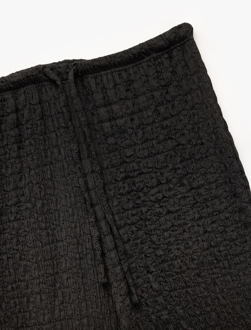   Beli Bağlamalı Dokulu Bol Düz Paça Pantolon