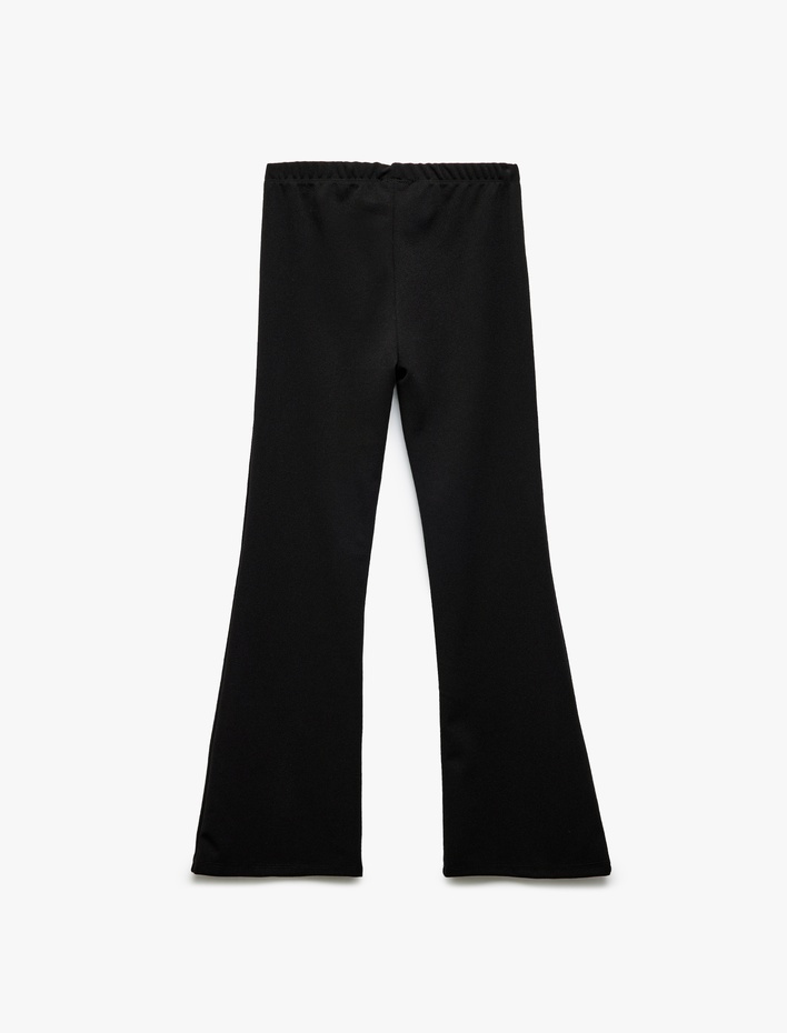 Kız Çocuk Yırtmaç Detaylı Dar Kesim İspanyol Paça Pantolon