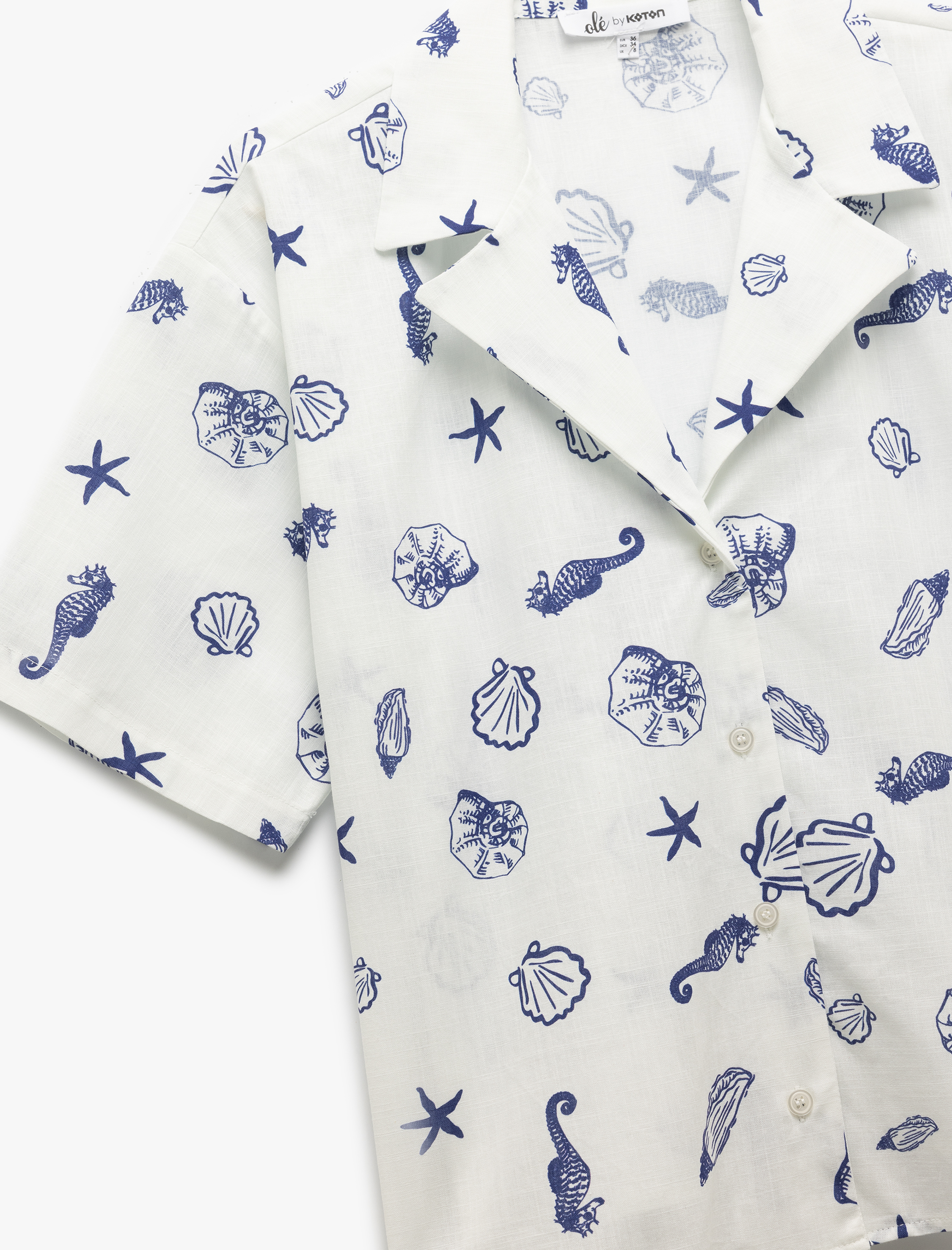   Devrik Yaka Kısa Kollu Deniz Kabuğu Detaylı Oversize Gömlek