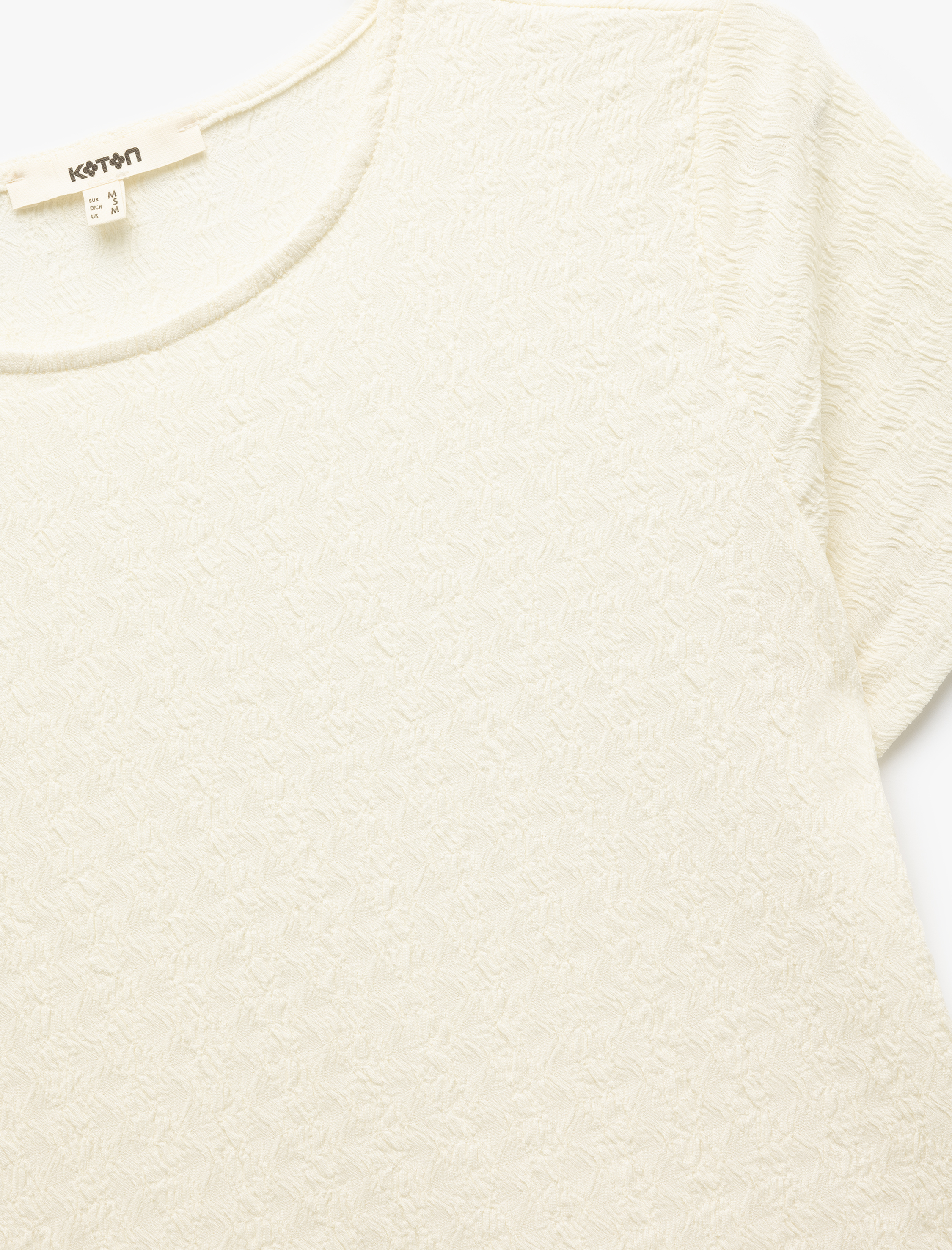   Bürümcük Kumaş Dokulu Kısa Kollu Bisiklet Yaka Peplum Tişört