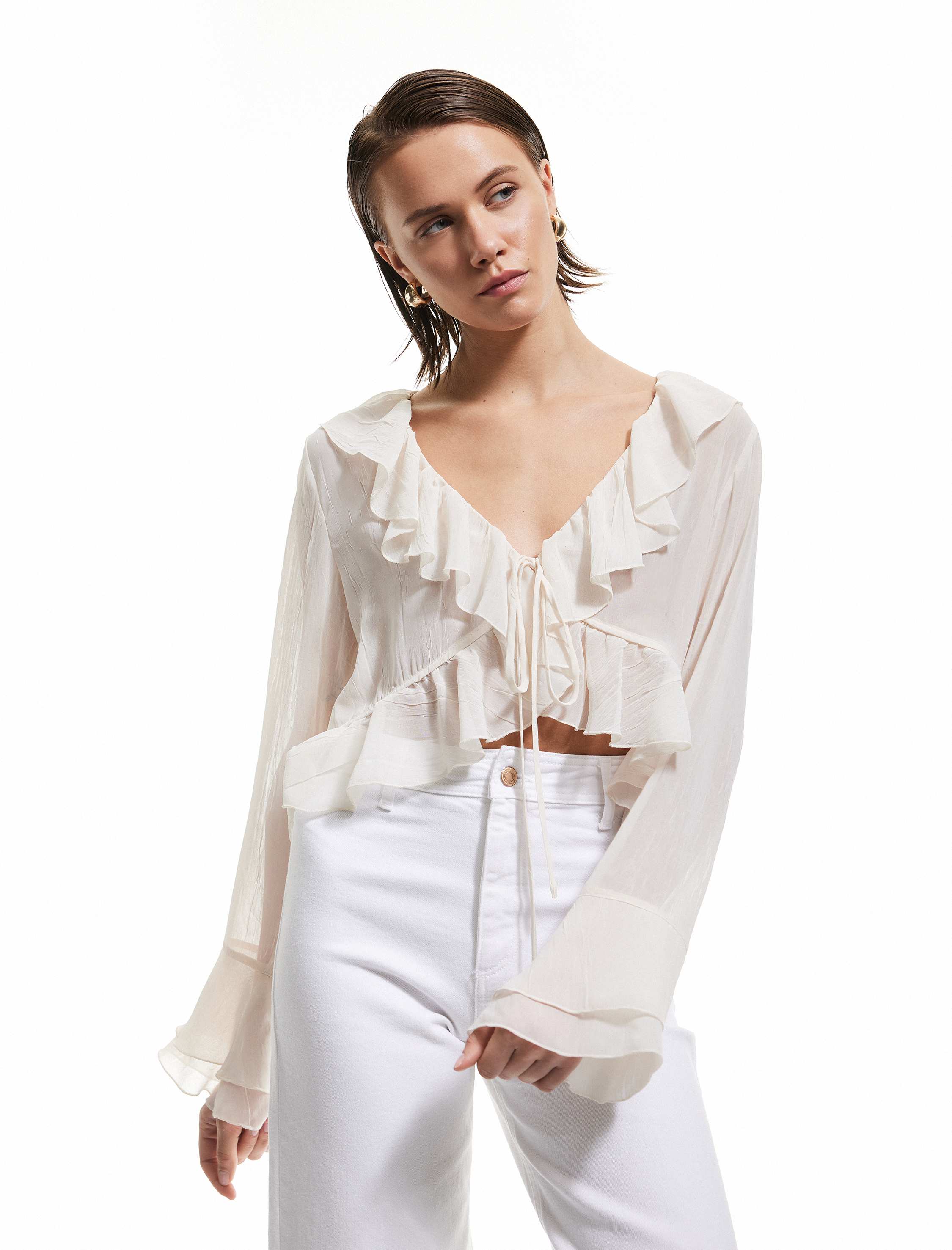 Önden Bağlama Detaylı Asimetrik Uzun Kollu Fırfırlı Crop Bluz