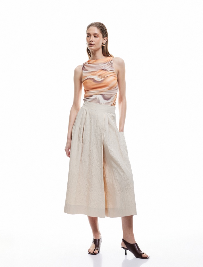  Koton X Sima Tarkan - Etek Pantolon Asimetrik Pile Detaylı Rahat Kalıp