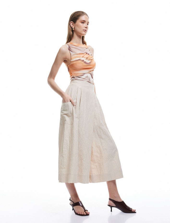  Koton X Sima Tarkan - Etek Pantolon Asimetrik Pile Detaylı Rahat Kalıp