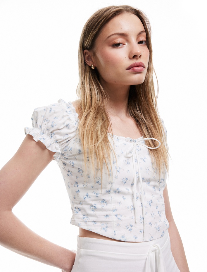  Kayık Yaka Bağcık Detaylı Fermuarlı Çiçekli Dar Kesim Poplin Crop Bluz